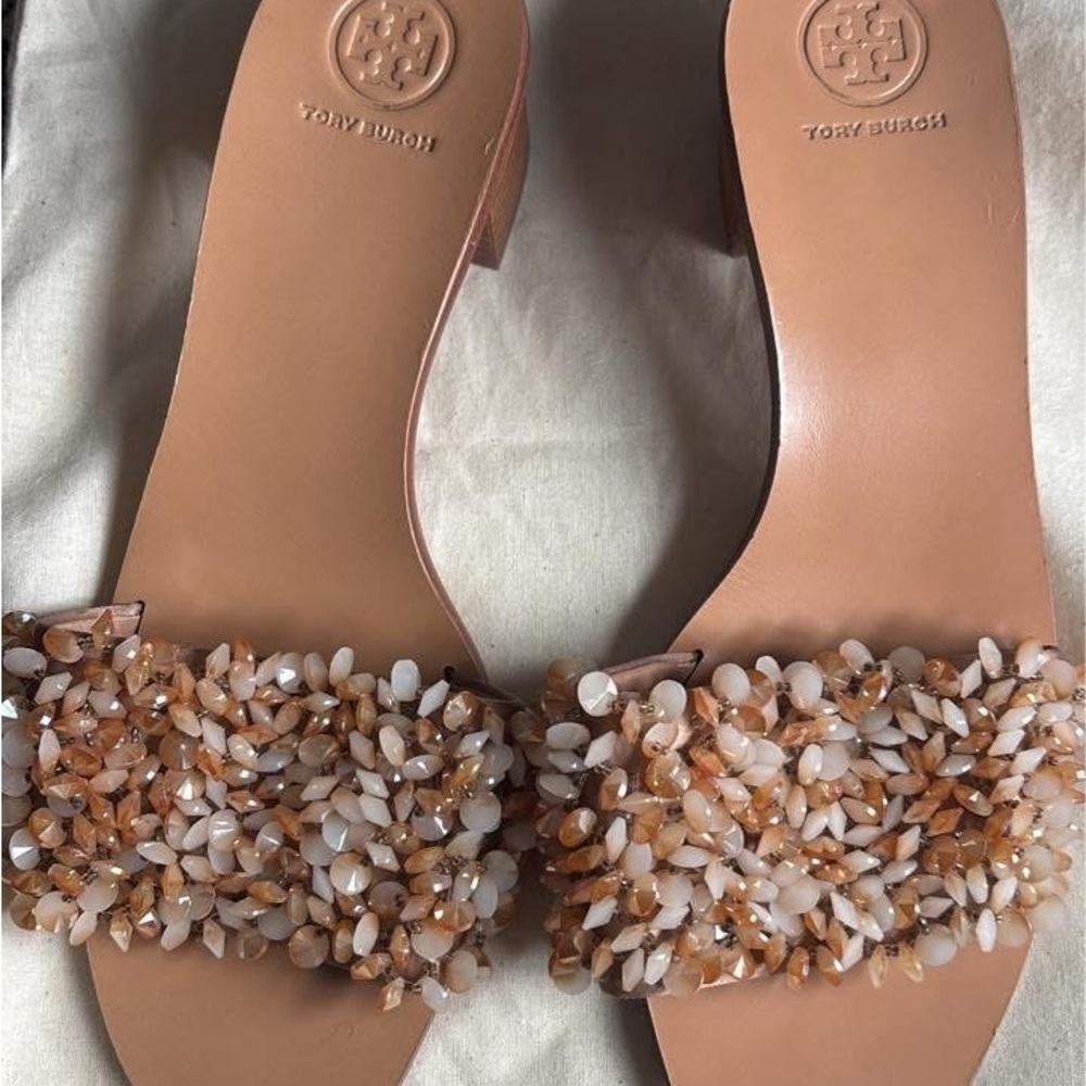 Tory Burch Cream Sandals with Open Toe and Decorative Embellishments